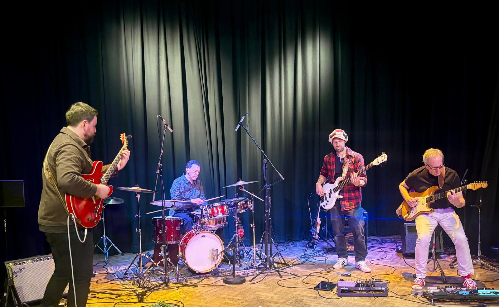 Dez Ezé performing live on stage